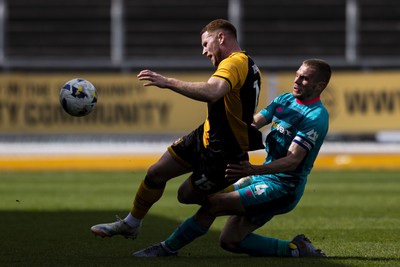 110426 - Newport County v Harrogate Town - Sky Bet League 2 - Jack Evans of Harrogate Town fouls Lee Jenkins of Newport County