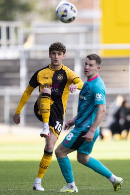110426 - Newport County v Harrogate Town - Sky Bet League 2 - Harrison Biggins of Newport County in action against Bryn Morris of Harrogate Town