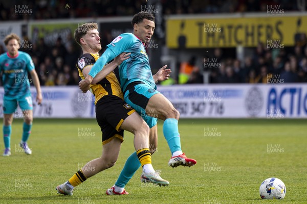110426 - Newport County v Harrogate Town - Sky Bet League 2 - Stephen Duke-McKenna of Harrogate Town in action against Cameron Evans of Newport County