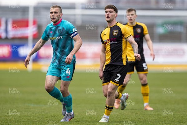 110426 - Newport County v Harrogate Town - Sky Bet League 2 - Cameron Evans of Newport County in action against Jack Evans of Harrogate Town