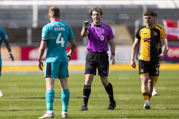 110426 - Newport County v Harrogate Town - Sky Bet League 2 - Referee Neil Hair with Jack Evans of Harrogate Town