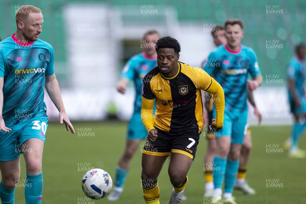 110426 - Newport County v Harrogate Town - Sky Bet League 2 - Bobby Kamwa of Newport County in action against Liam Gibson of Harrogate Town