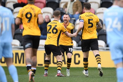 150325 - Newport County v Harrogate Town - Sky Bet League 2 - Cameron Evans of Newport County celebrates scoring the first goal of the game with team mates