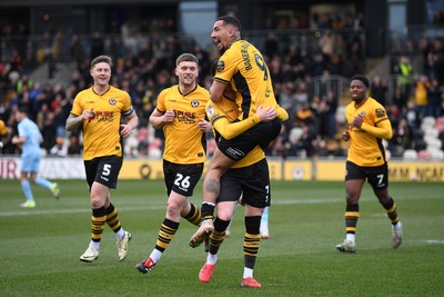 150325 - Newport County v Harrogate Town - Sky Bet League 2 - Courtney Baker-Richardson of Newport County celebrates scoring the second goal of the match with team mates