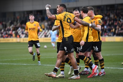 150325 - Newport County v Harrogate Town - Sky Bet League 2 - Courtney Baker-Richardson of Newport County celebrates scoring the second goal of the match with team mates