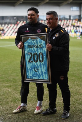 150325 - Newport County v Harrogate Town - Sky Bet League 2 - Nick Townsend of Newport County is presented a jersey by Newport Head Coach, Nelson Jardim for his 200th appearance