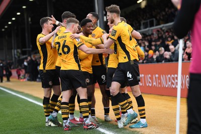 150325 - Newport County v Harrogate Town - Sky Bet League 2 - James Clarke of Newport County celebrates scoring a goal with team mates