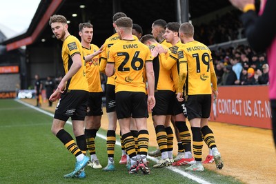 150325 - Newport County v Harrogate Town - Sky Bet League 2 - James Clarke of Newport County celebrates scoring a goal with team mates