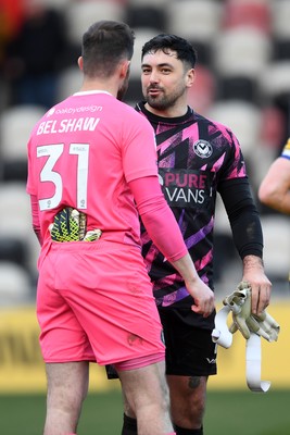 150325 - Newport County v Harrogate Town - Sky Bet League 2 - Nick Townsend of Newport County with James Belshaw of Harrogate Town at full time