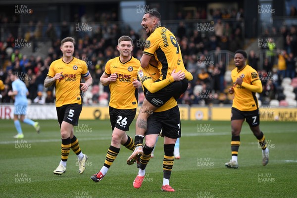 150325 - Newport County v Harrogate Town - Sky Bet League 2 - Courtney Baker-Richardson of Newport County celebrates scoring the second goal of the match with team mates