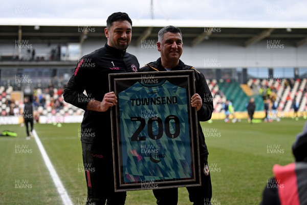 150325 - Newport County v Harrogate Town - Sky Bet League 2 - Nick Townsend of Newport County is presented a jersey by Newport Head Coach, Nelson Jardim for his 200th appearance