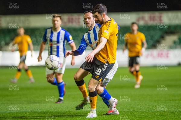 180322 - Newport County v Hartlepool United - Sky Bet League 2 - Finn Azaz of Newport County holds off the challenge of Jamie Sterry of Hartlepool United