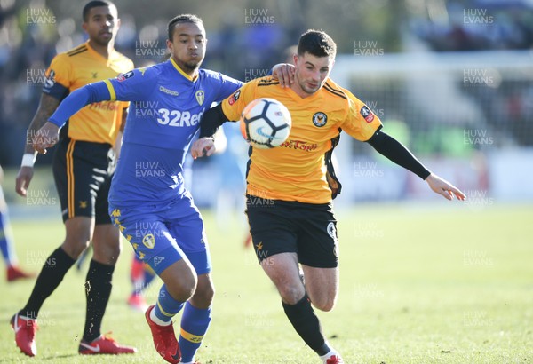 070118 - Newport County v Leeds United, Emirates FA Cup Round 3 - Padraig Amond of Newport County and Cameron Borthwick Jackson of Leeds United compete for the ball