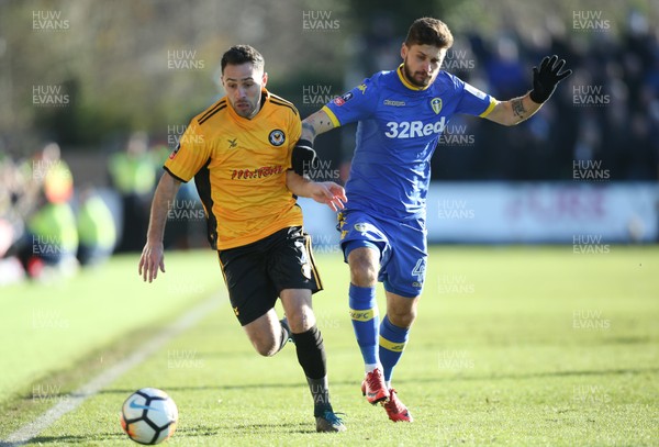 070118 - Newport County v Leeds United, Emirates FA Cup Round 3 - Robbie Willmott of Newport County holds of Mateusz Klich of Leeds United