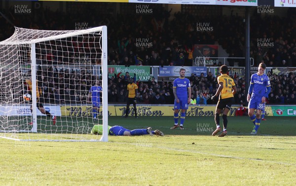 070118 - Newport County v Leeds United, Emirates FA Cup Round 3 - Conor Shaughnessy of Leeds United turns the ball into his own net as he challenges Shawn McCoulsky of Newport County to score own goal and level the score