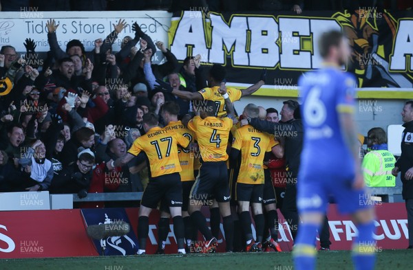 070118 - Newport County v Leeds United, Emirates FA Cup Round 3 - Shawn McCoulsky of Newport County celebrates infant of the fans after scoring the winning goal