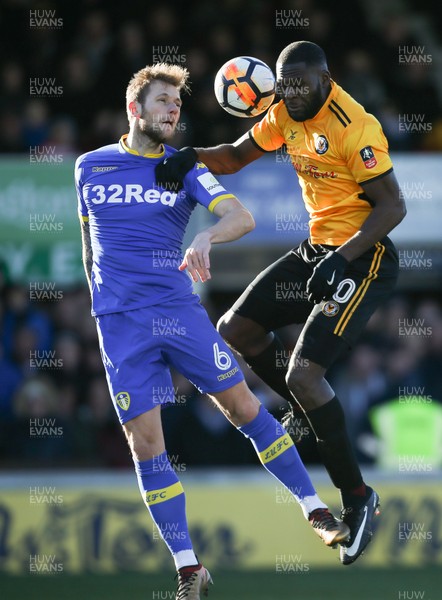 070118 - Newport County v Leeds United, Emirates FA Cup Round 3 - Frank Nouble of Newport County and Liam Cooper of Leeds United compete for the ball