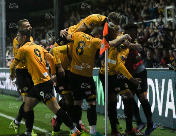 060119 - Newport County v Leicester City, FA Cup Third Round - Jamille Matt of Newport County celebrates with team mates after he heads to score goal