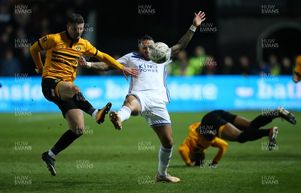 060119 - Newport County v Leicester City, FA Cup Third Round - Padraig Amond of Newport County and Danny Simpson of Leicester City compete for the ball