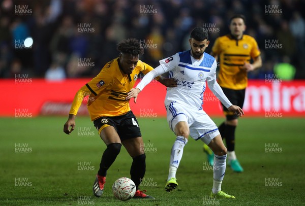 060119 - Newport County v Leicester City, FA Cup Third Round - Antoine Semenyo of Newport County holds off Rachid Ghezzal of Leicester City