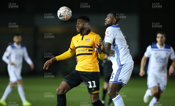 060119 - Newport County v Leicester City, FA Cup Third Round - Jamille Matt of Newport County holds off Wes Morgan of Leicester City