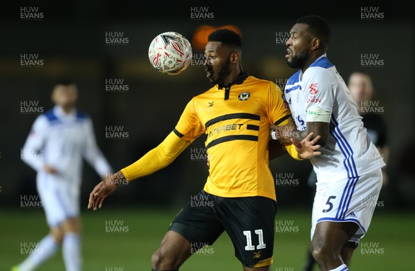 060119 - Newport County v Leicester City, FA Cup Third Round - Jamille Matt of Newport County holds off Wes Morgan of Leicester City