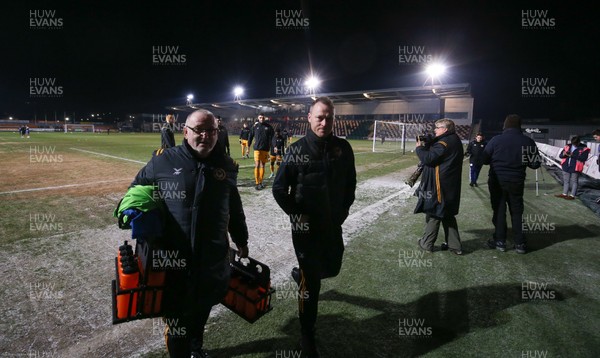 210120 - Newport County v Leicester City U21s, EFL Leasingcom Trophy Quarter-Final - Newport County manager Michael Flynn, centre, leaves the pitch as it announced that the match is postponed due to a frozen pitch just 20 minutes before it was due to start