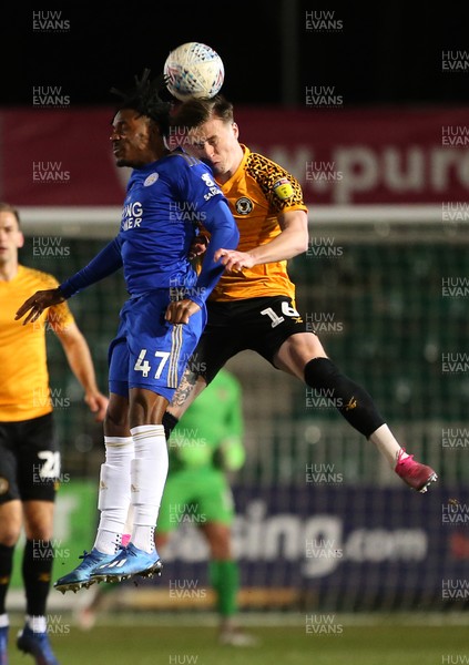 040220 - Newport County v Leicester City U21s - Leasingcom Trophy - Josh Eppiah of Leicester City U21s and George Nurse of Newport County go up for the ball