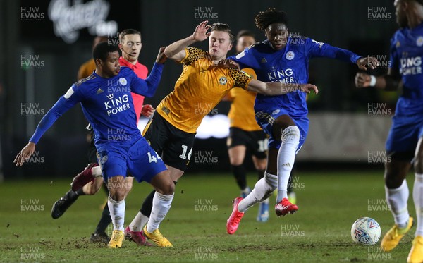 040220 - Newport County v Leicester City U21s - Leasingcom Trophy - George Nurse of Newport County is tackled by Vontae Daley-Campbell and Calvin Ughelumba of Leicester City U21s
