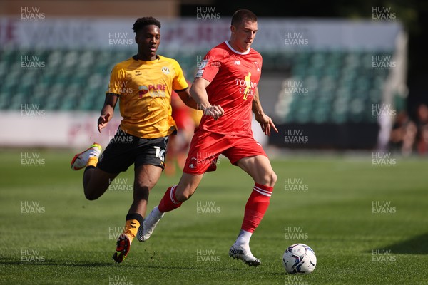 040921 - Newport County v Leyton Orient - SkyBet League Two - Alex Mitchell of Leyton Orient is challenged by Timmy Abraham of Newport County