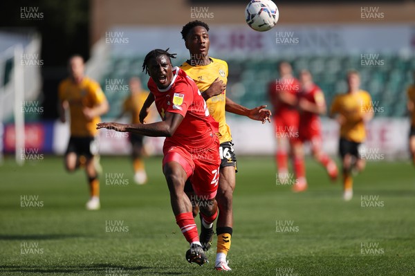 040921 - Newport County v Leyton Orient - SkyBet League Two - Shadrach Ogie of Leyton Orient goes down in front of Timmy Abraham of Newport County