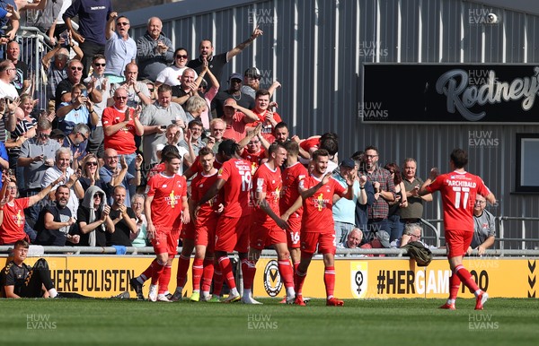 040921 - Newport County v Leyton Orient - SkyBet League Two - Harry Smith of Leyton Orient celebrates scoring a goal with team mates