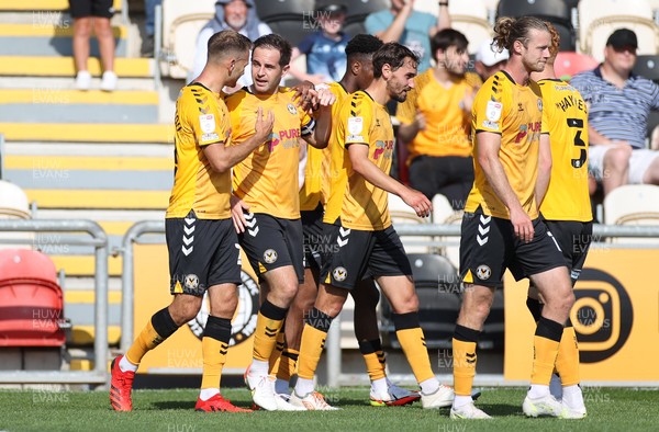 040921 - Newport County v Leyton Orient - SkyBet League Two - Matthew Dolan of Newport County celebrates scoring a goal from the penalty spot with team mates