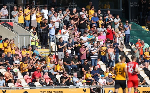040921 - Newport County v Leyton Orient - SkyBet League Two - Fans applaud in the 49th minute in memory of Justin Edinburgh, former manager 