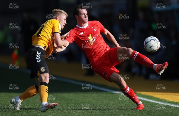 040921 - Newport County v Leyton Orient - SkyBet League Two - Theo Archibald of Leyton Orient is challenged by Ollie Cooper of Newport County