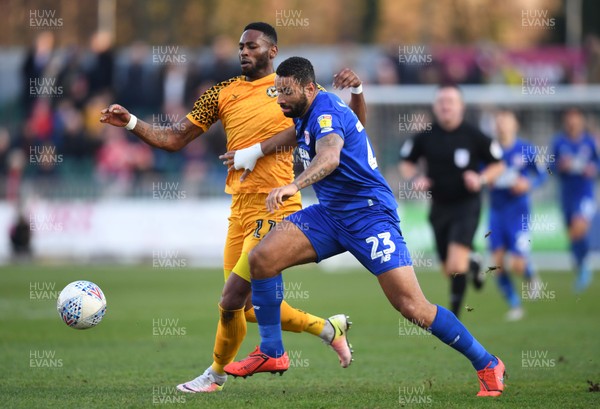 291219 - Newport County v Leyton Orient - SkyBet League 2 - Jamille Matt of Newport County is tackled by Jamie Turley of Leyton Orient