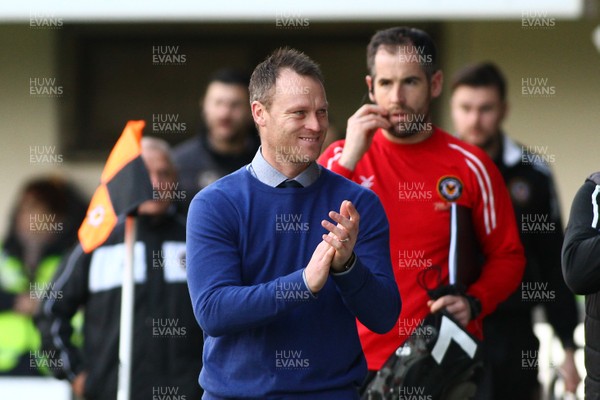 231217 - Newport County v Lincoln City - Sky Bet League 2 - Manager of Newport County Michael Flynn applauds the crowd before kick off 