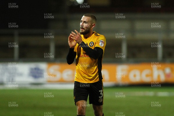 231217 - Newport County v Lincoln City - Sky Bet League 2 - Dan Butler of Newport County applauds the crowd at the final whistle