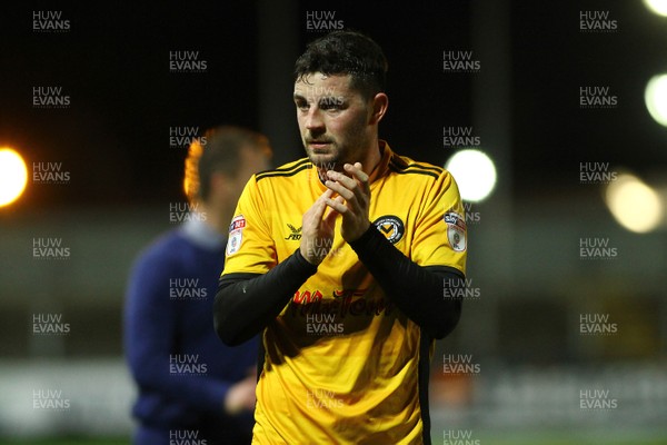 231217 - Newport County v Lincoln City - Sky Bet League 2 - Padraig Amond of Newport County applauds the crowd at the final whistle