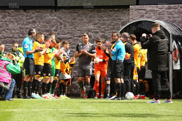 270419 Newport County v Lincoln City - Sky Bet League 2 - Players of Newport County form a guard of honour for League winners Lincoln City 