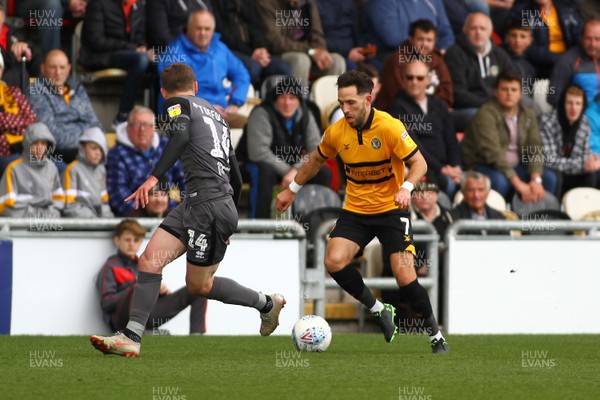 270419 Newport County v Lincoln City - Sky Bet League 2 - Robbie Willmott of Newport County takes on Harry Toffolo of Lincoln City 