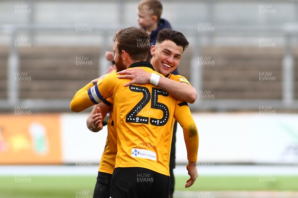 270419 Newport County v Lincoln City - Sky Bet League 2 - Regan Poole and Mark O Brien of Newport County celebrate at full time 