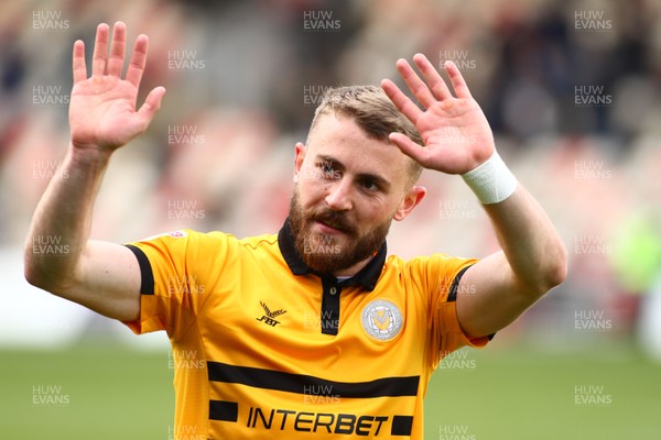 270419 Newport County v Lincoln City - Sky Bet League 2 - Dan Butler of Newport County celebrates with fans after the final whistle 