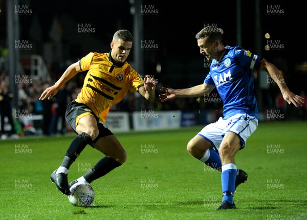 021018 - Newport County v Macclesfield Town - SkyBet League 2 - Tyler Hornby-Forbes of Newport County is tackled by David Fitzpatrick of Macclesfield Town