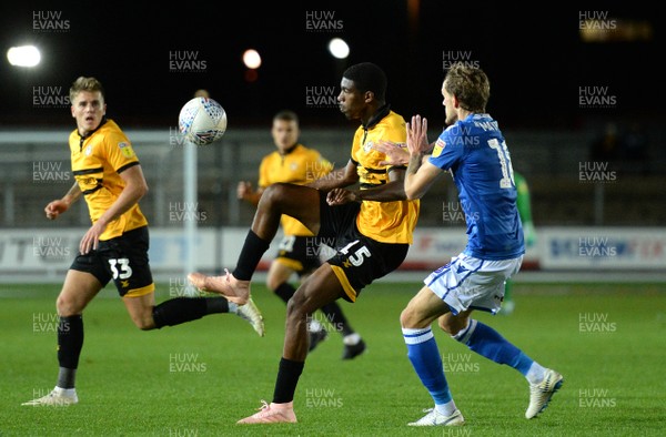 021018 - Newport County v Macclesfield Town - SkyBet League 2 - Tyreeq Bakinson of Newport County is tackled by Callum Maycock of Macclesfield Town