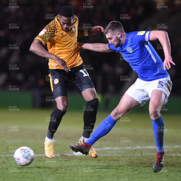 280120 - Newport County v Macclesfield Town - Sky Bet League 2 - Jamille Matt of Newport County holds off the challenge of Fiacre Kelleher of Macclesfield Town 