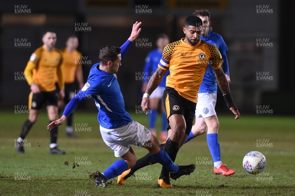 280120 - Newport County v Macclesfield Town - Sky Bet League 2 - Joss Labadie of Newport County is tackled by David Fitzpatrick of Macclesfield Town 