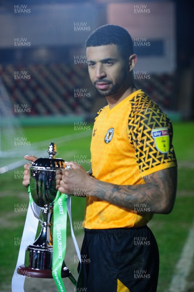 280120 - Newport County v Macclesfield Town - Sky Bet League 2 - Joss Labadie of Newport County holds the Unsponsored Derby Trophy 