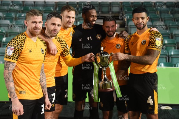 280120 - Newport County v Macclesfield Town - Sky Bet League 2 - Newport County players hold the Unsponsored Derby Trophy 