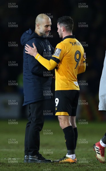 160219 - Newport County v Manchester City - FA Cup 5th Round - Padraig Amond of Newport County shakes hands with Manchester City Manager Pep Guardiola at full time